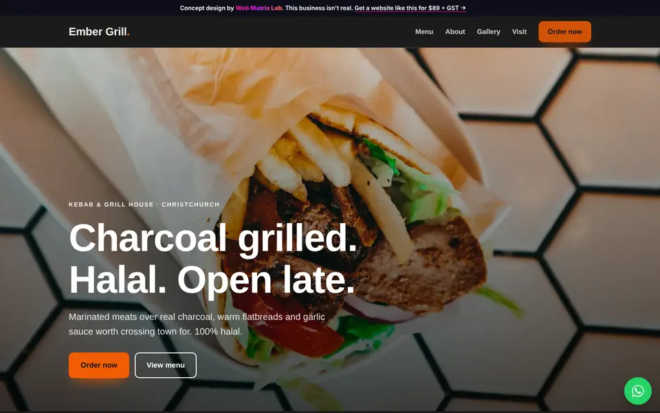 Ember Grill concept website on a laptop