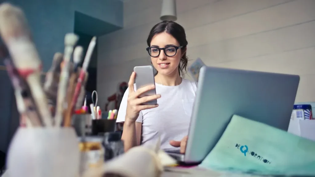 Woman looking at a takeaway menu on her phone